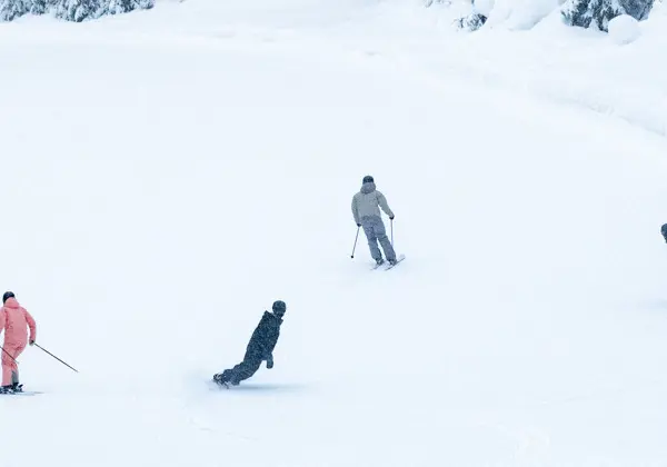 Skiers make their first turns at the alpine opening