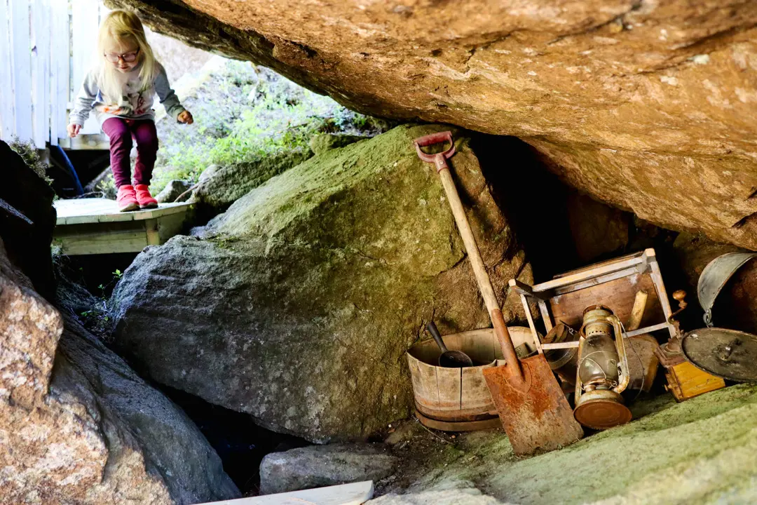 A little girl finds a hideout among the boulders where the trolls have left remnants from the time they lived here in Trollsterhusen.